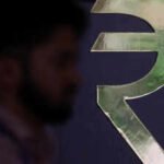 1787030633 rupee weakens against us dollar