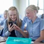 a new kansas law bars students from accessing phones earbuds and smartwatches all school day while one parent group is pushing for tighter ipad limits