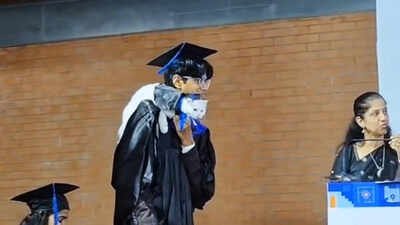 cat attends convocation with graduate professors reaction leaves internet amused