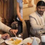 man teaches eating dosa with fork