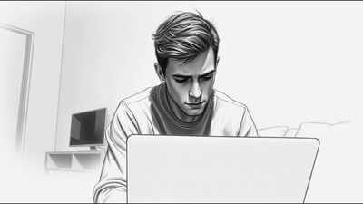 melancholy young man at laptop