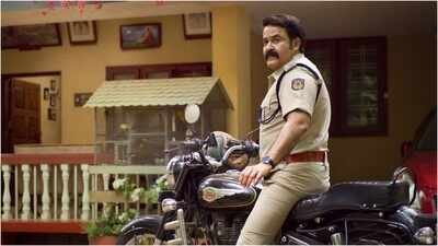 mohanlal shares onam poster of athimanoharam actor appears as cop ts lovelajan fb