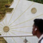 rupee rises 9 paise against us dollar