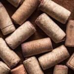 gardeners putting corks in their potted plants