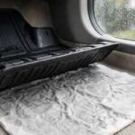 why putting newspaper under your car mats during the rainy season can help keep the carpet dry