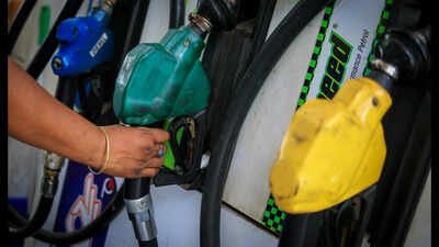 a worker holds a nozzle to pump fuel in a vehicle at a petrol pump in new delhi india may 19 2026