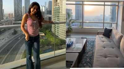 content creator uses white interiors low profile furniture and skyline views that make a small home look bigger and brighter