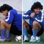 dalma dressed in yellow was seen putting flowers into her fathers socks as he sat on a football and watched her