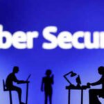 file photo figurines with computers and smartphones are seen in front of the words cyber security in this illustration taken february 19 2024