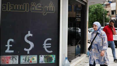 iraq devalues its currency