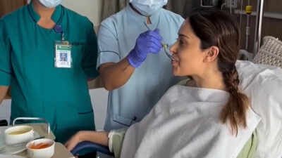 nushrratt bharuccha shares first video from hospital as she recovers from spine injury medical staff feed her meal while gerua plays on tv dreaming endlessly