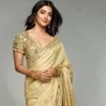 pooja hegde serves timeless ethnic elegance in a beige gold tissue silk saree worth rs 191 lakh image credits instagram