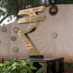 rupee rises 10 paise against us dollar