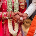 woman planning destination wedding questions tradition as in laws expect her side to cover expenses